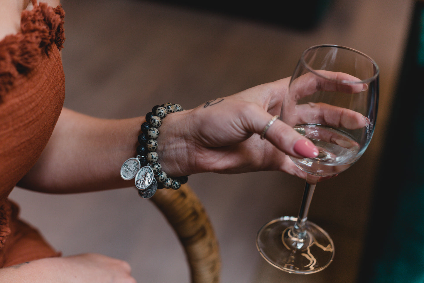 model wearing crystal-jewellery-for-gifts BRACELET | DALMATIAN JASPER