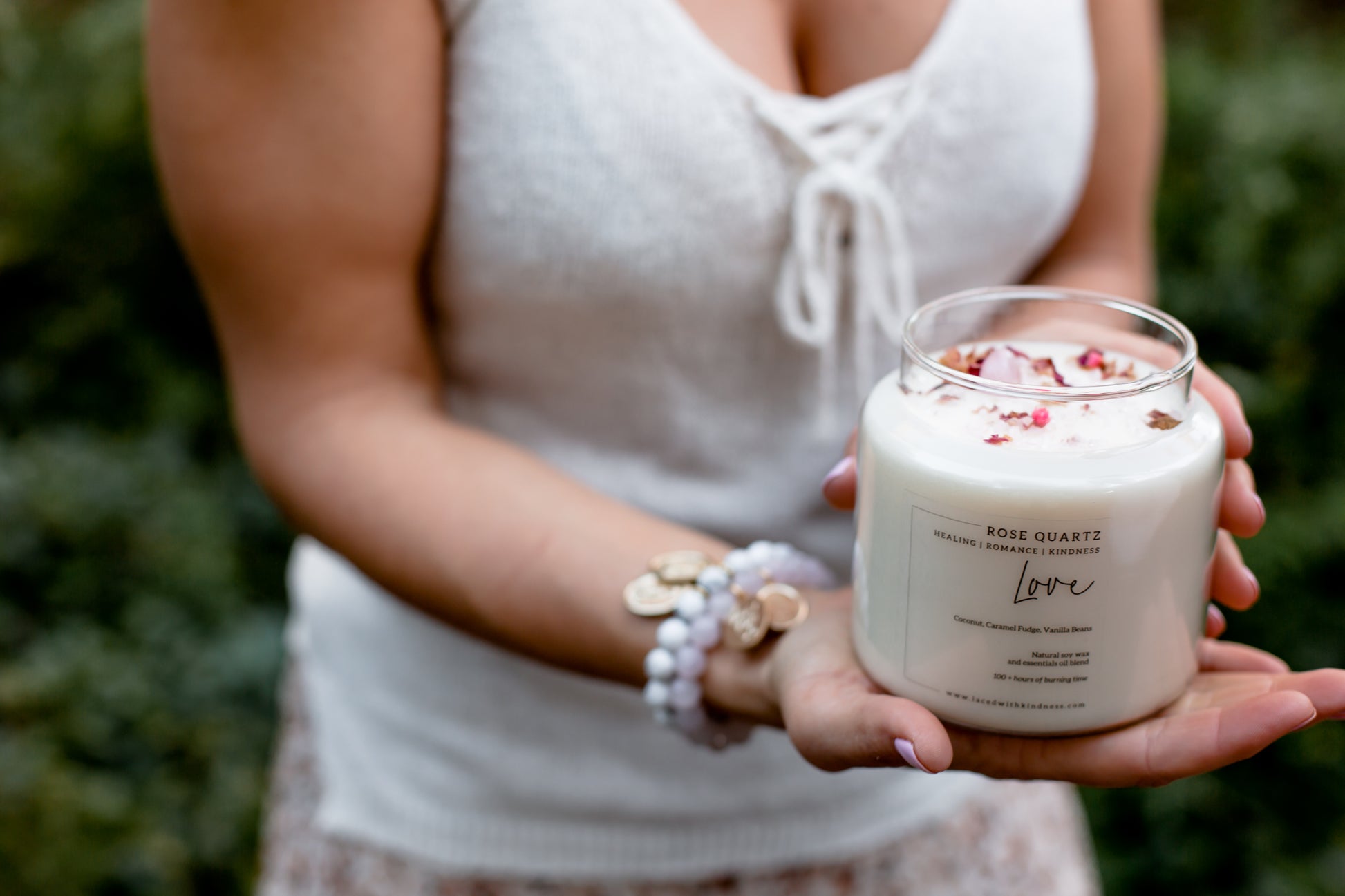 Candle Crystal Homewares Love Rose Quartz. Scent is Coconut, Caramel Fudge, Vanilla Bean. Candle is Glass, held in palm